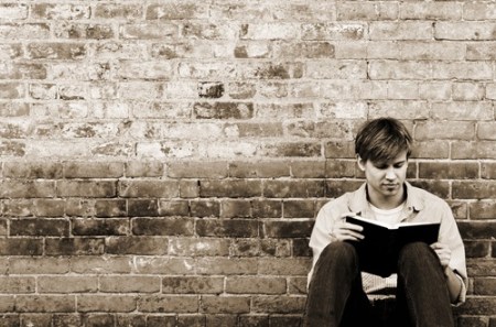young-man-reading-964491_894279473